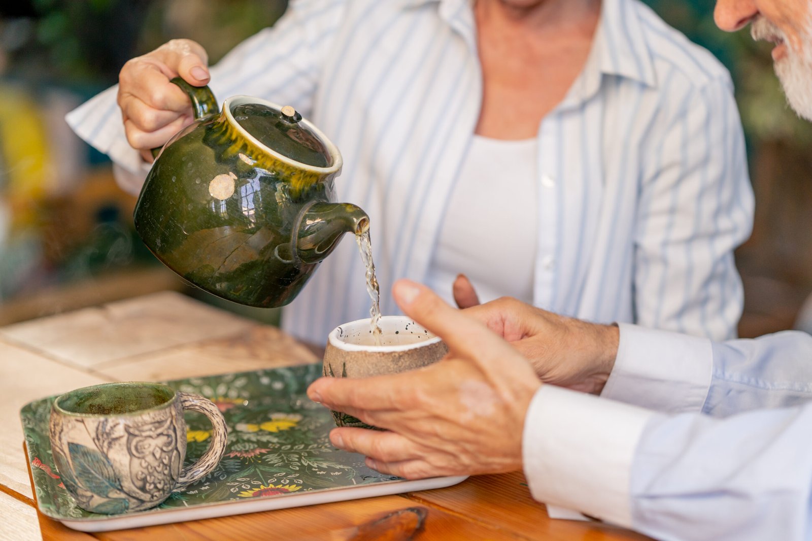 Elderly couple enjoying tea together